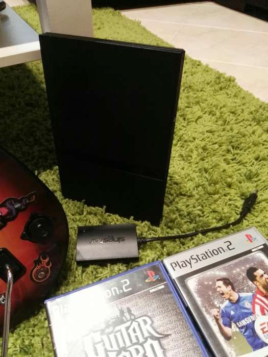 PlayStation 2 + Guitar Hero + Sing Star + Fifa