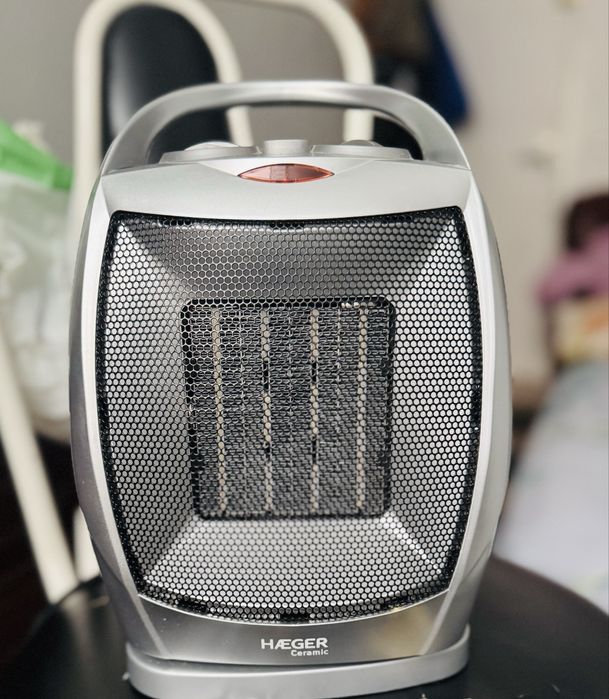 Bagagem de mão e ventoinha de pequenas dimensões (calor e frio).