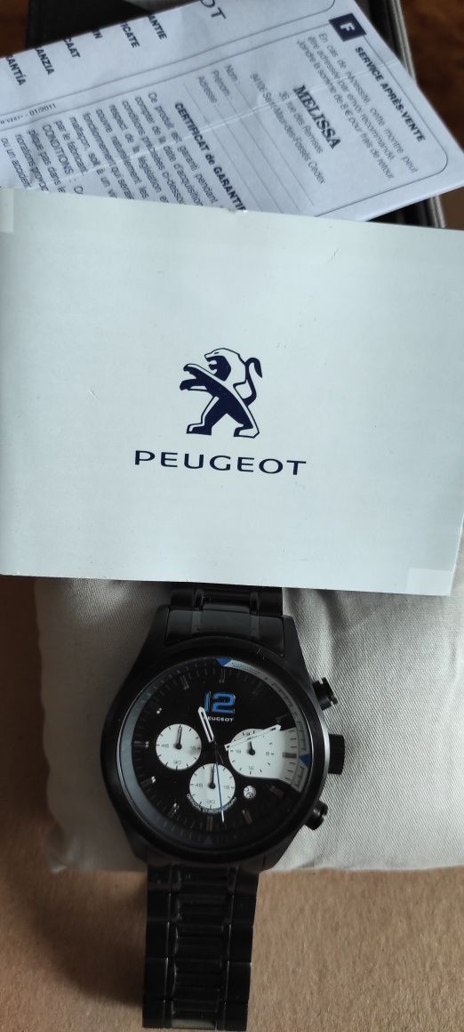 Годинник Peugeot
