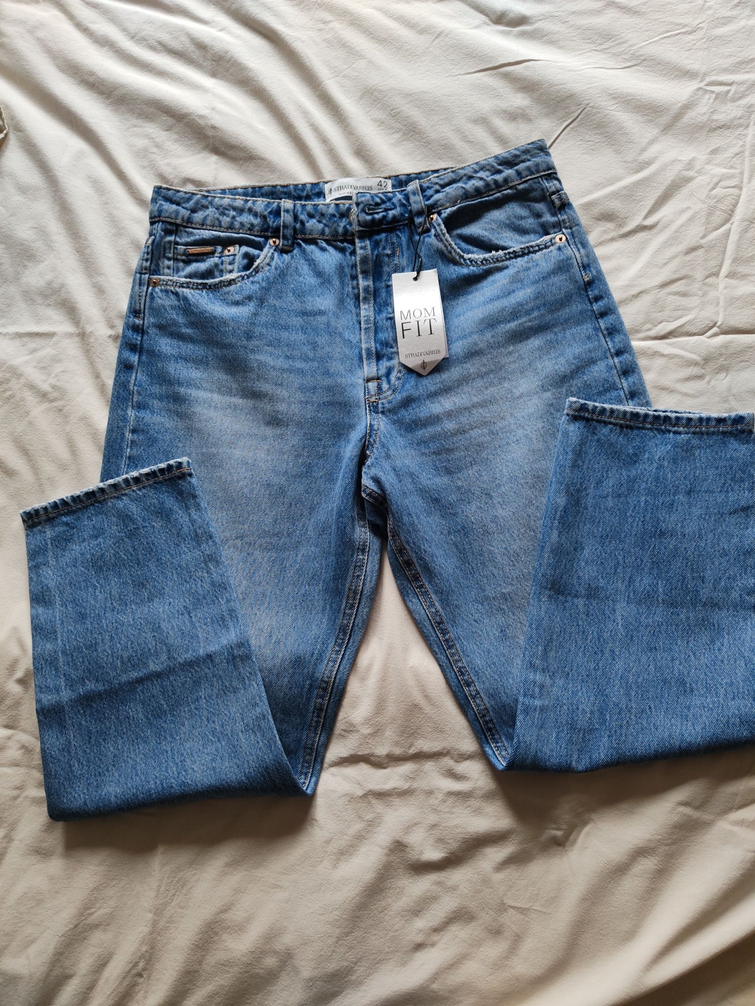 Jeansy zwężane Stradivarius 42 nowe