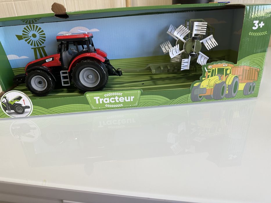 Іграшка трактор нова
