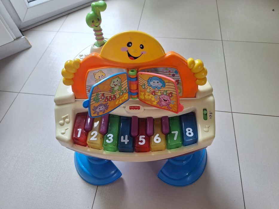 Pianino Fisher Price, stolik interaktywny, zabawki intwraktywne