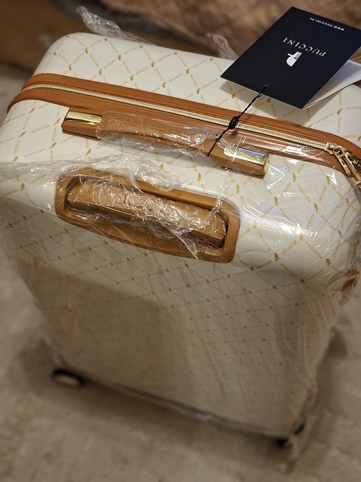 Średnia walizka Puccini z kolekcji Saint Tropez biała
