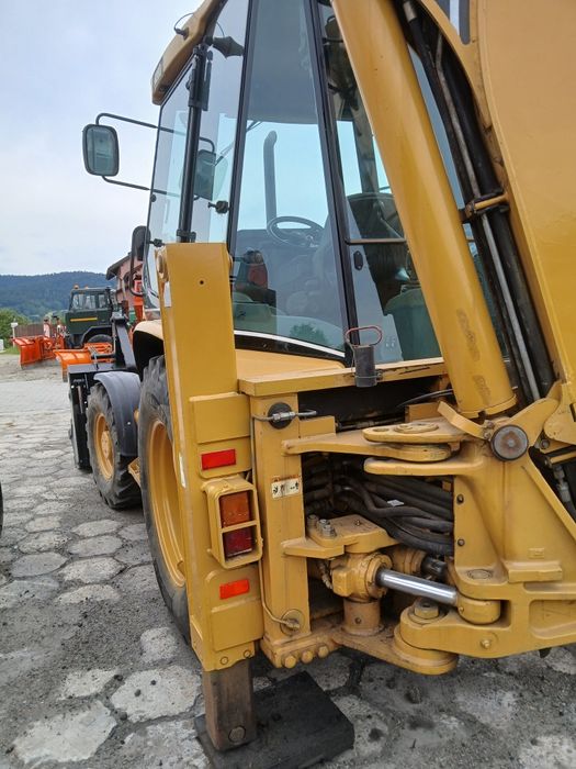 Koparko-ładowarka CAT 428D JCB CASE VOLVO