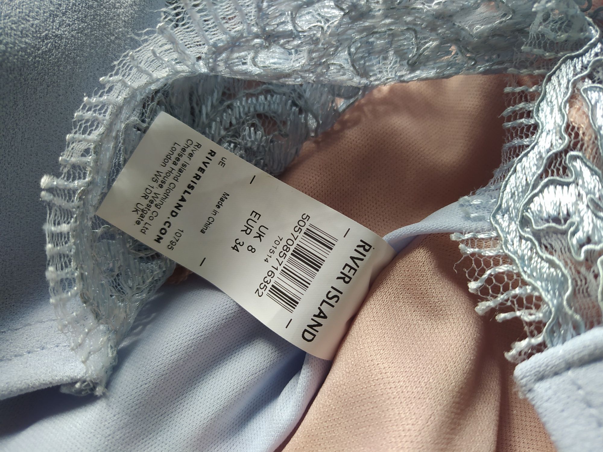 Koronkowa, opinająca, sukienka błękitna  River Island  roz. 34