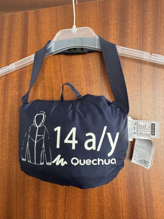 Corta vento com bolsa