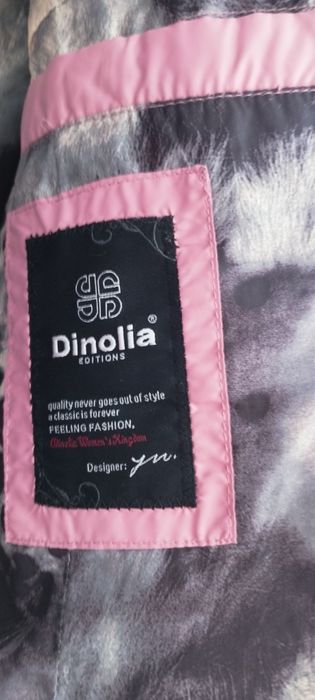 Жіночий пуховик 48 р бежевий колір,все добре.,стан ідеальний .