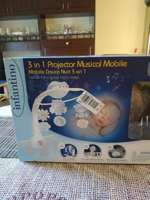 Продам латинську музикальну надкроватну іграшку недорого