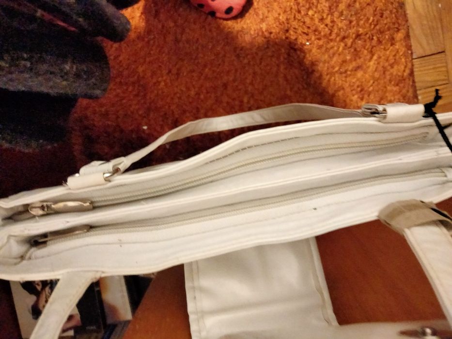 Mala em pele verdadeira.