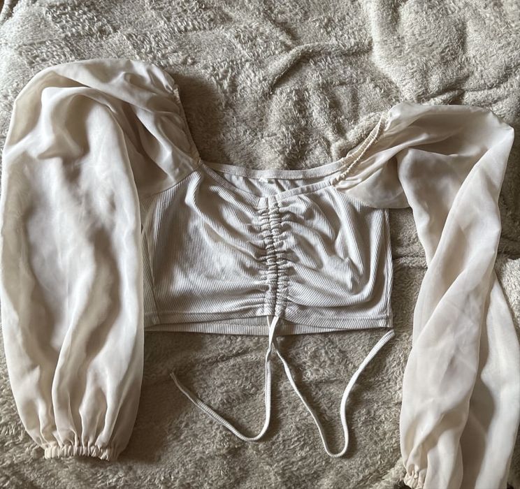 топ пудровий з прозорими рукавами