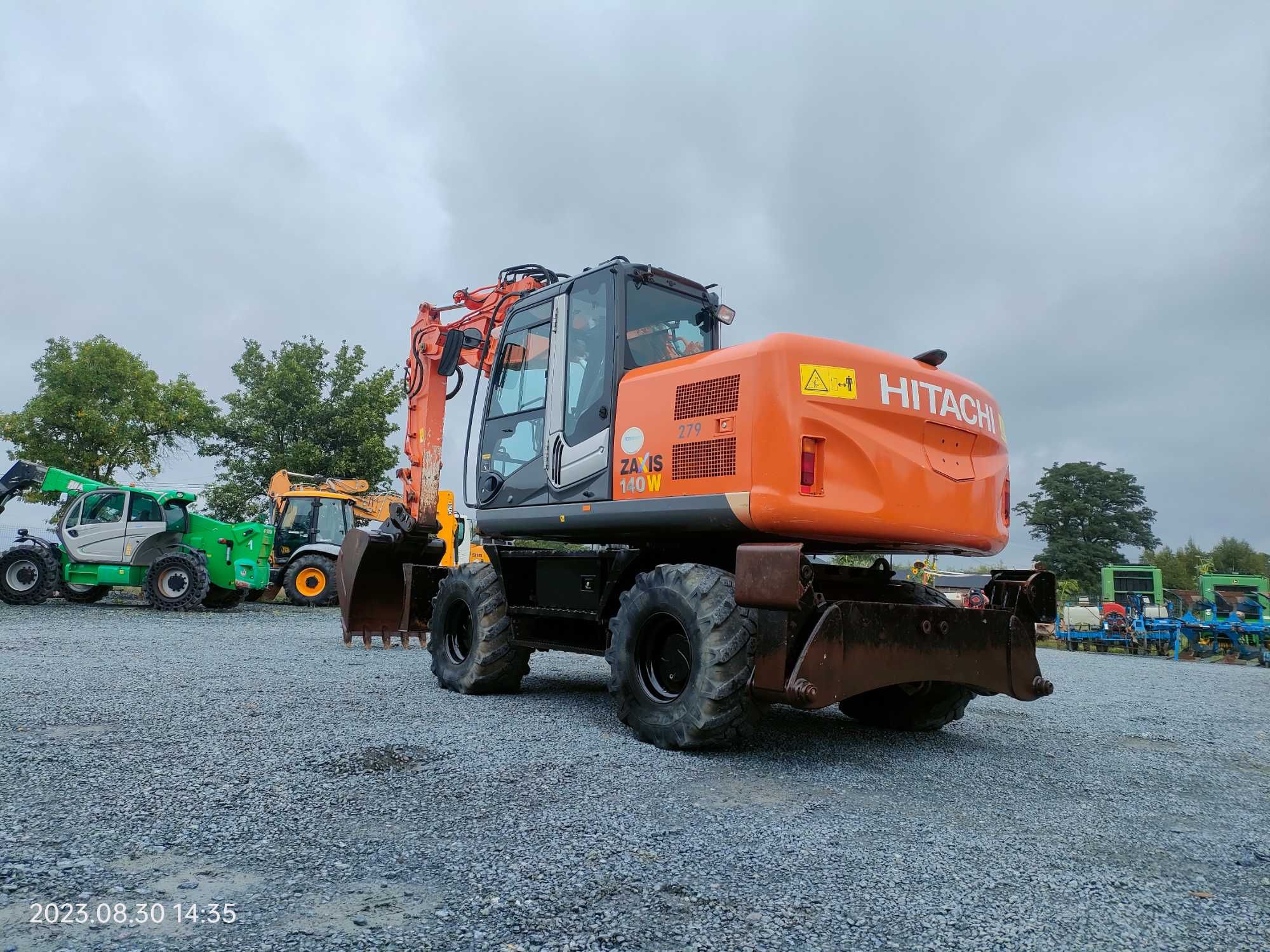 Koparka kołowa Hitachi Zaxis 140 W(cat,liebherr) W rok 2011