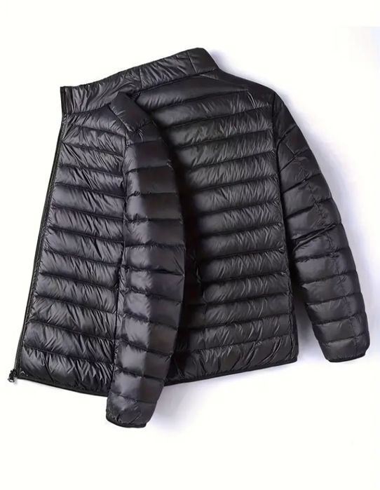 Мужской фирменный пуховик,отличное качество. Размер М, L