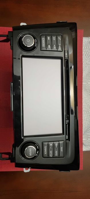 Nissan J11 radio/nawigacja, panel AC