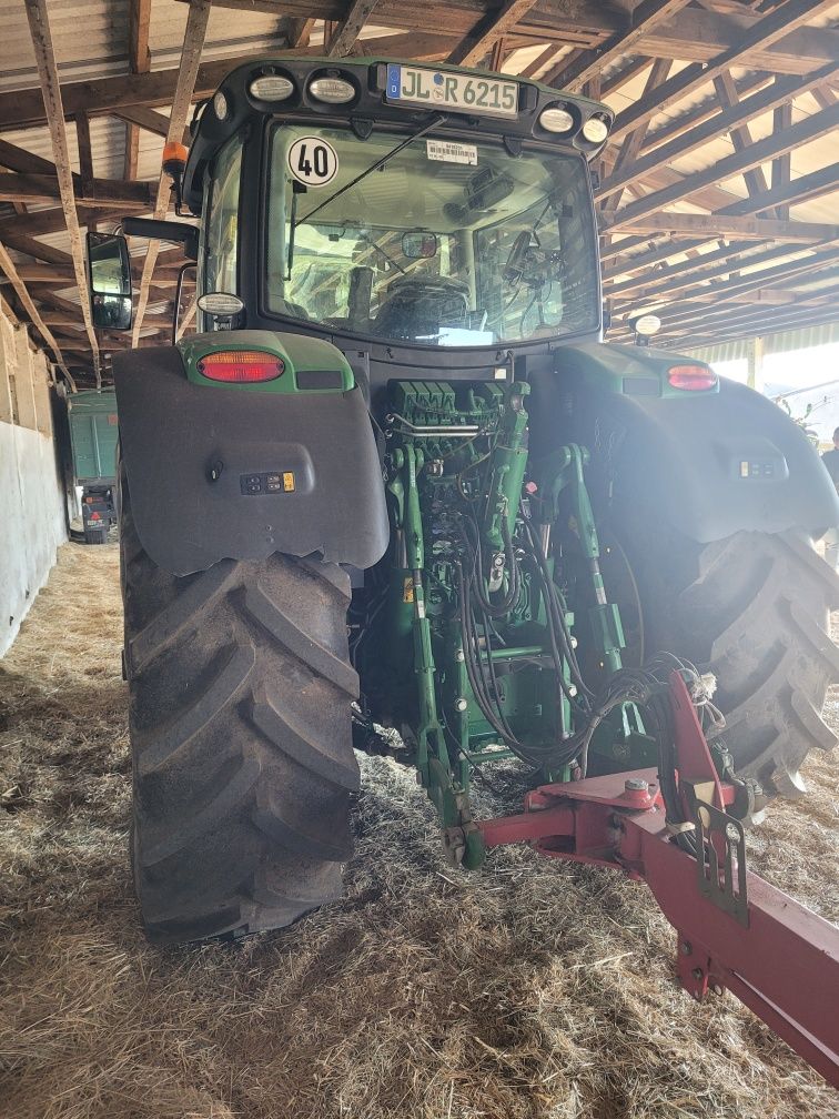 John Deere 6215R z Niemiec