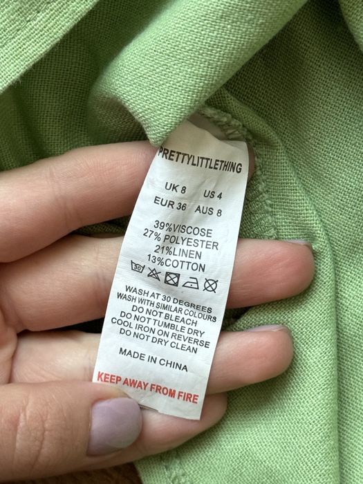 Зелена лляна нова юбка з драпіровкою