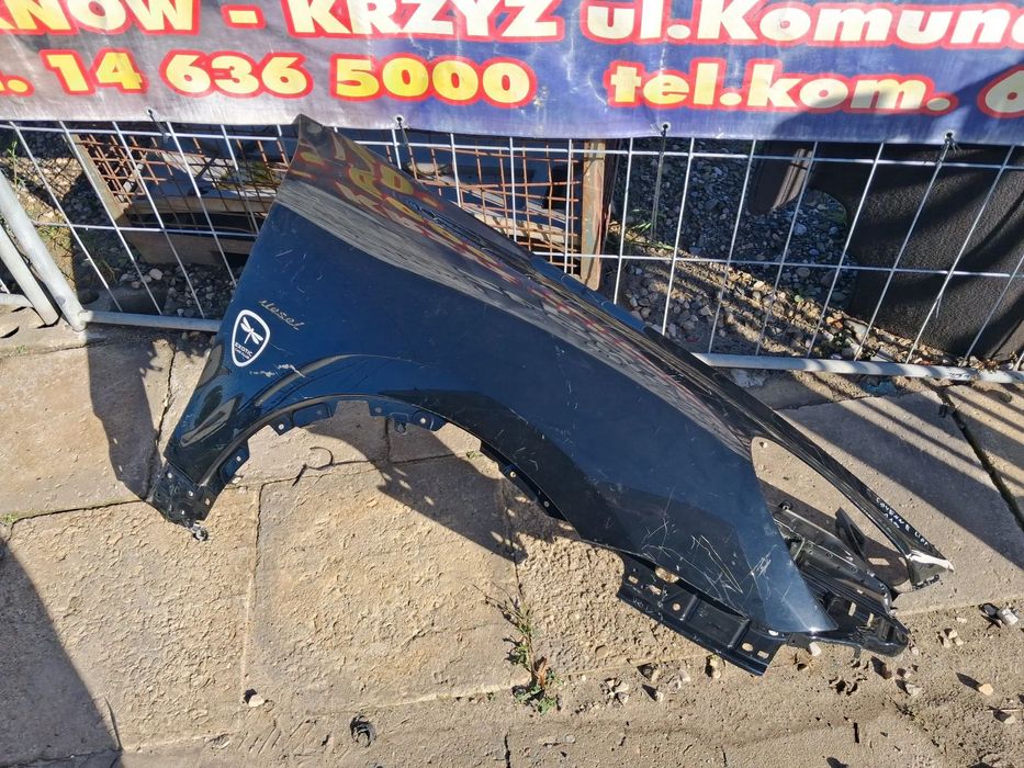 Porsche cayenne II 10-14 blotnik prawy 7P5821252