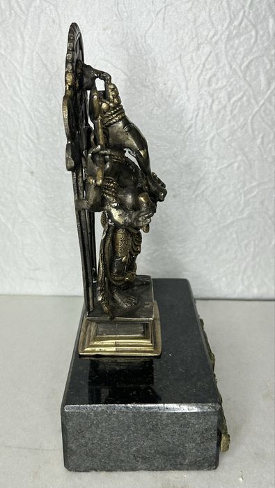 Антична бронзова статуя на мраморном питистале  Ганеші у позолоті