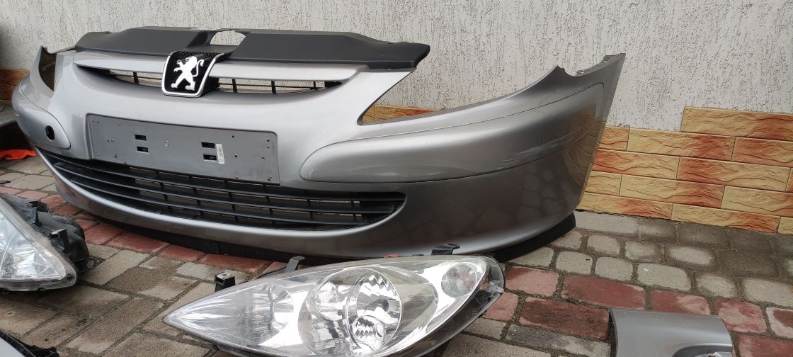 Бампер передній peugeot 307