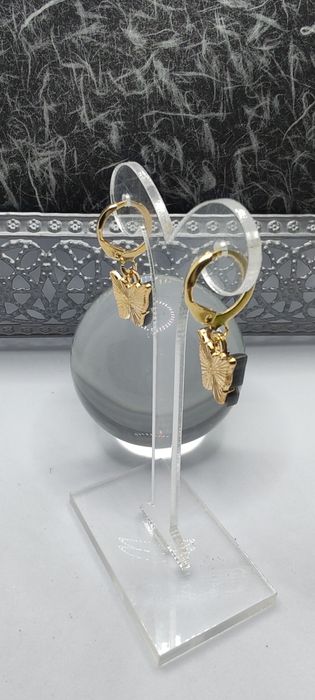 Brincos black butherfly