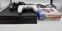 Konsola Playstation 4  + 2 pady + 4 gry