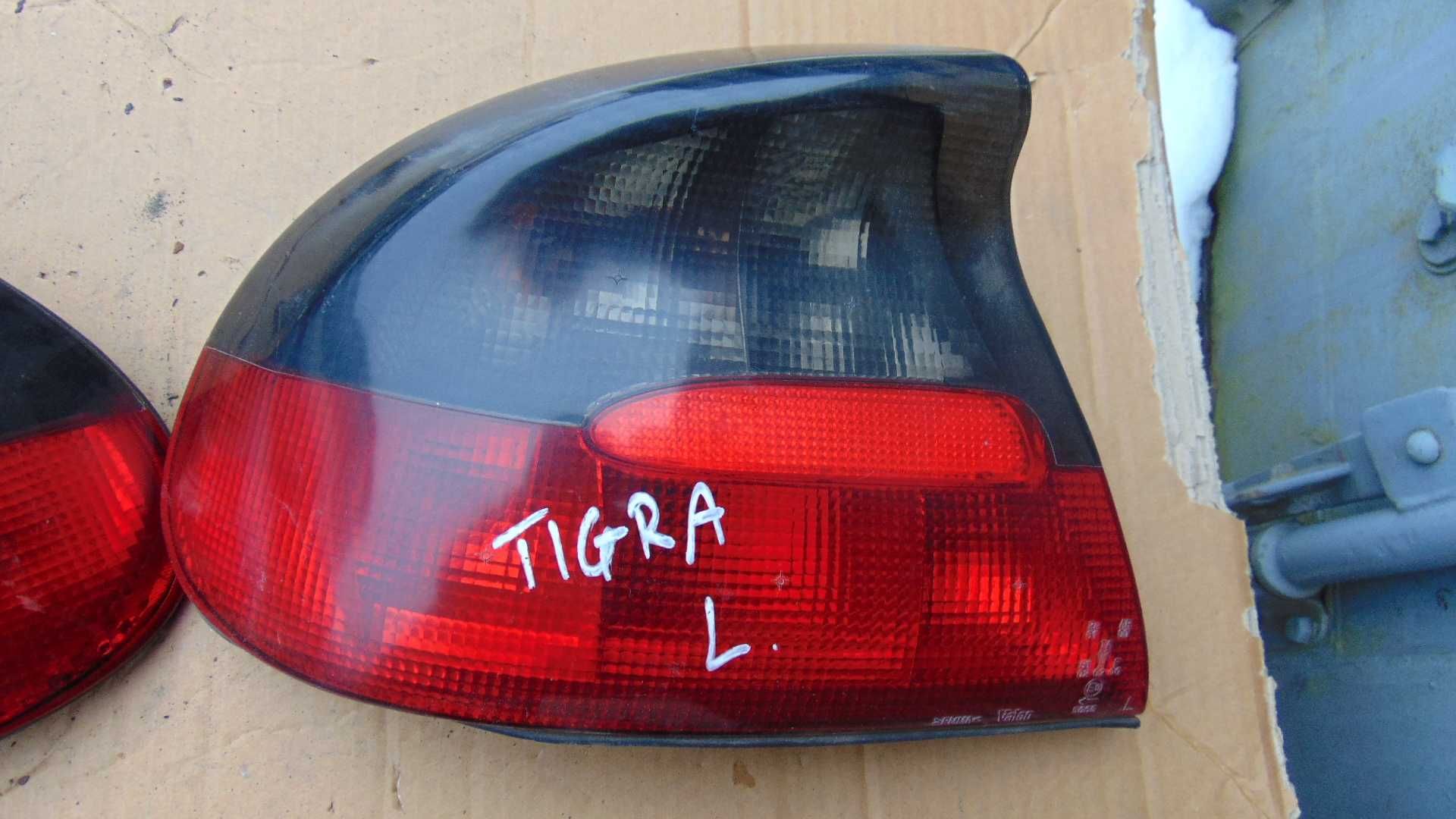 Mar55 Lampa lewa tylna lewy tył opel tigra wysyłka