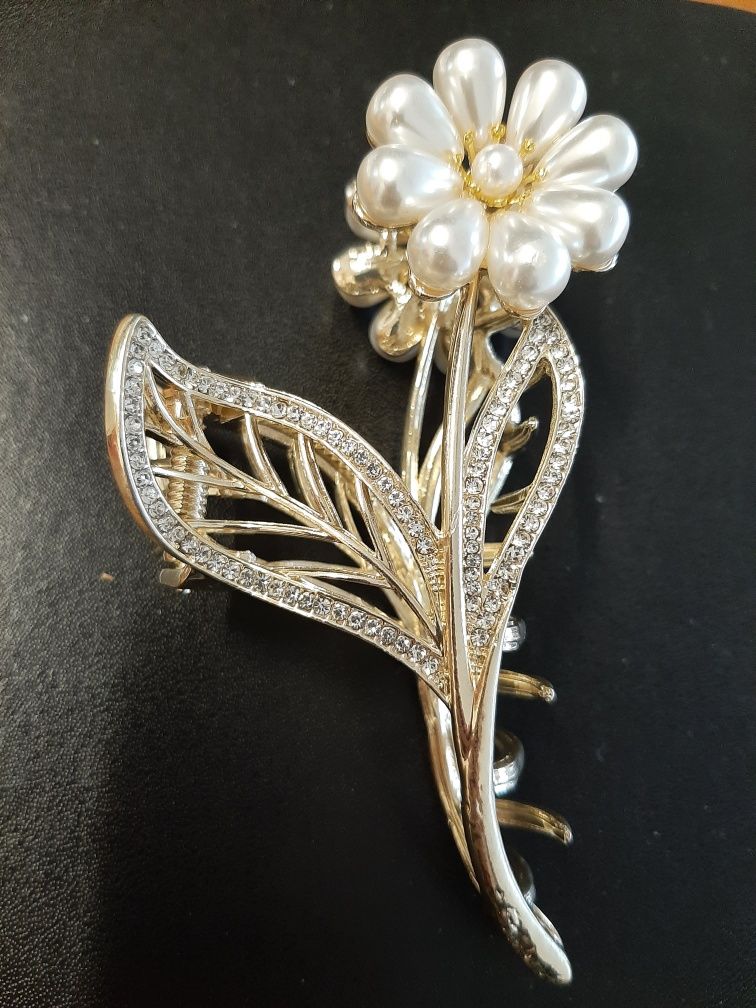 Mola de cabelo flor dourada nova
