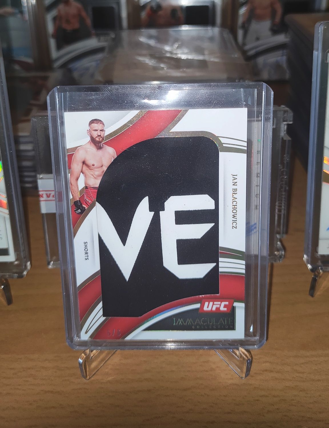 Karta UFC PANINI Immaculate Jan Błachowicz kawałek spodenek z walki /6