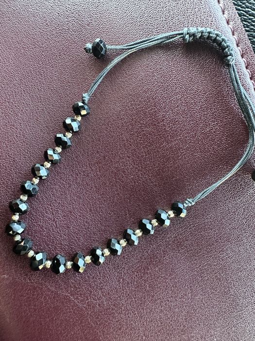 Браслет із золотими вставками