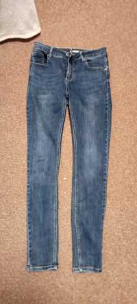 Spodnie jeansowe chłopięce. Róż 40
