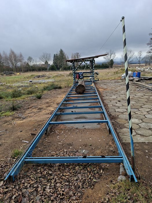 Trak do drewna tarczowy obrotowy