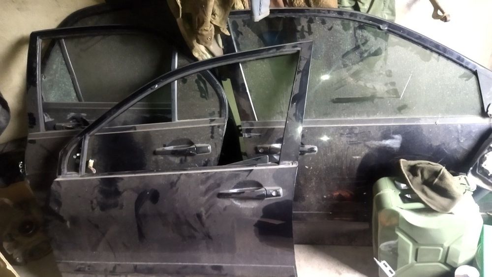 Двері лансер  мітсубіщі лансер 9