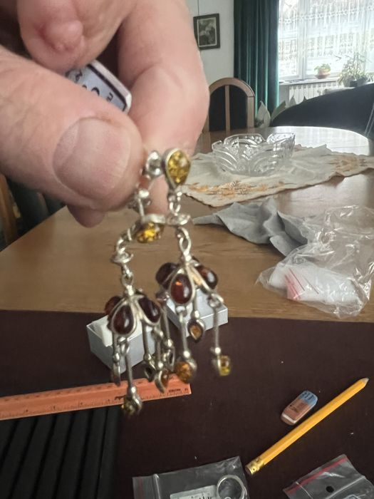 Вироби срібло з бурштином