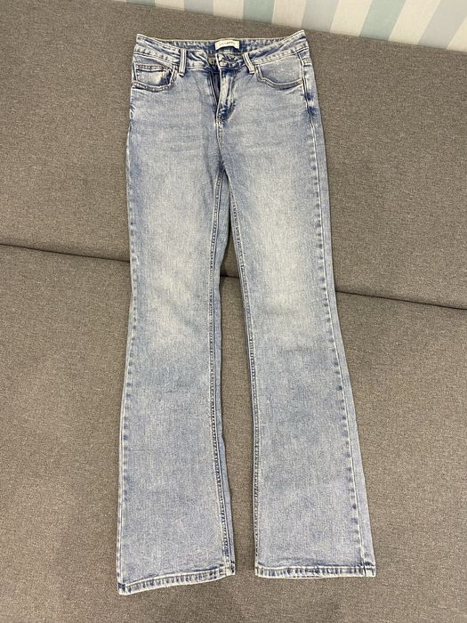 Продам джинси блакитні