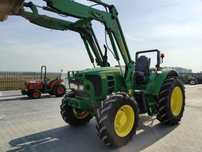 John Deere 6130 z turem i łyżką