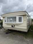 Całoroczny domek holenderski Willerby 11m/3.7m, 3 sypialnie, transport
