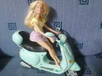 Barbie com mota.