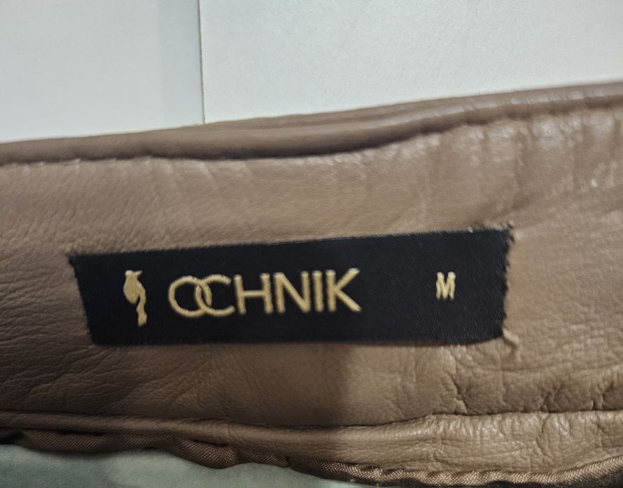 Beżowe spodnie Ochnik skórzane skóra