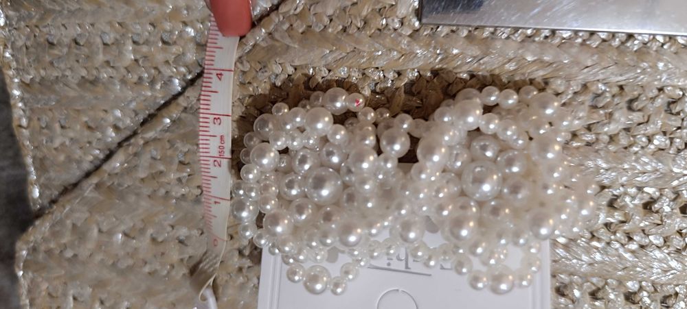 Brincos novos de pérolas