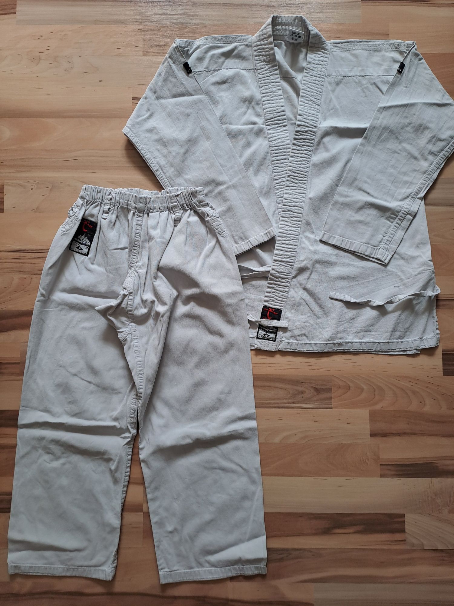biale kimono karate athlitech zestaw spodnie i gora na 140