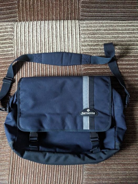 Сумка Samsonite через плечо. Дорожная спортивная сумка