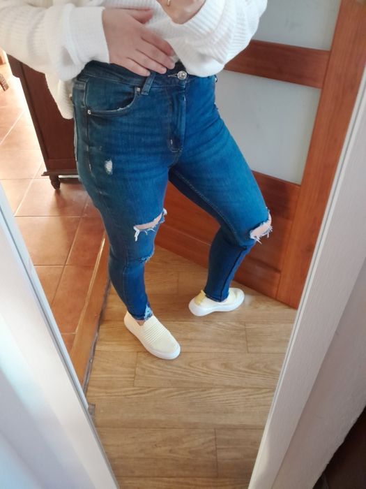 Dżinsy z dziurami XS/34