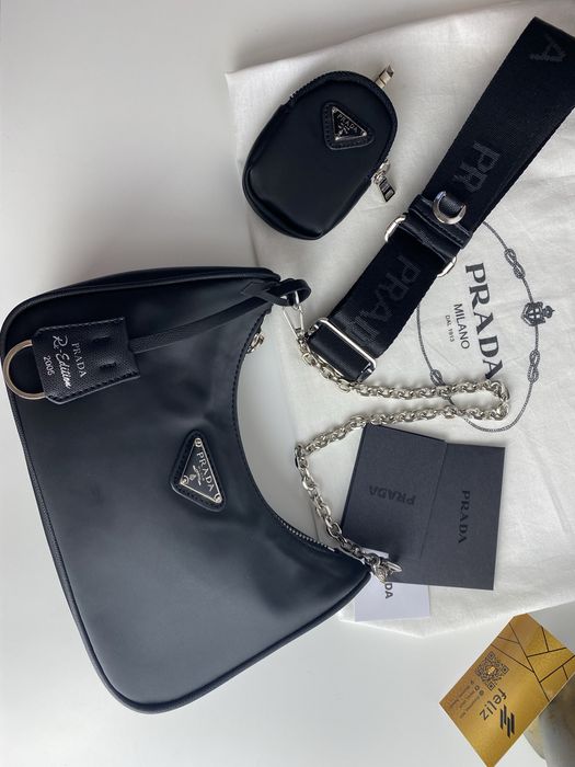 Torebka damska listonoszka w pudełku logowanum.