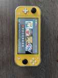 Nintendo Switch Lite на 32 гб + карта на 128 та купа ігор