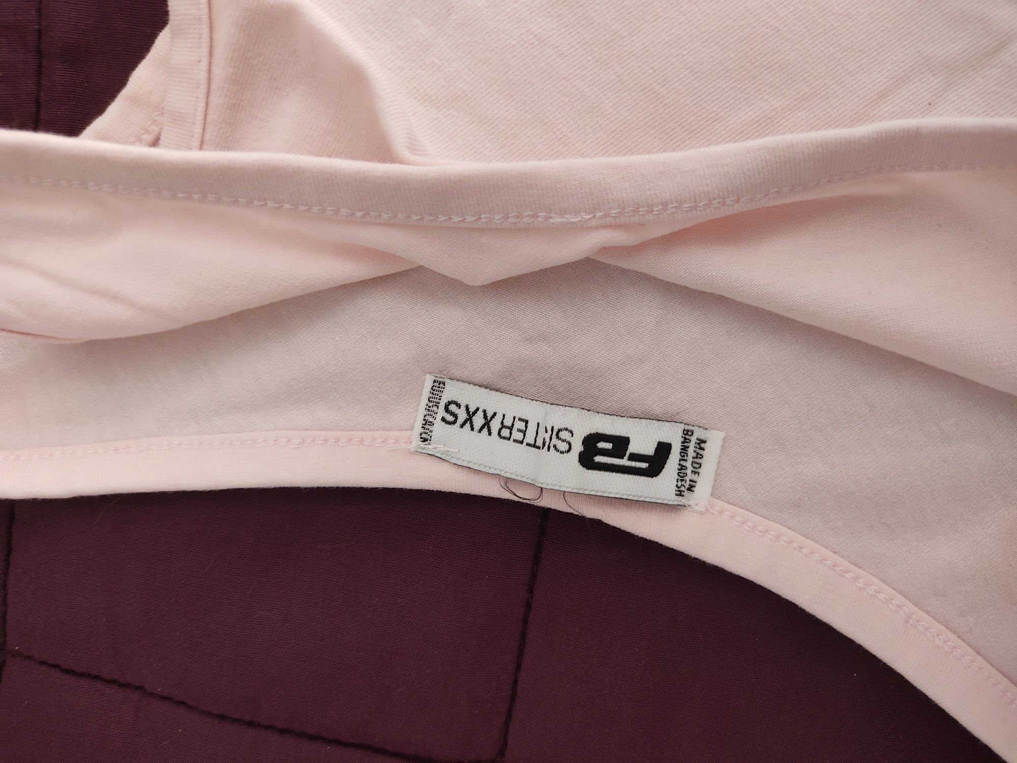 Top assimétrico rosa New Yorker