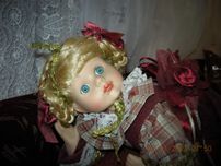 lalka porcelanowa leżąca dł. ok. 30 cm, antyk