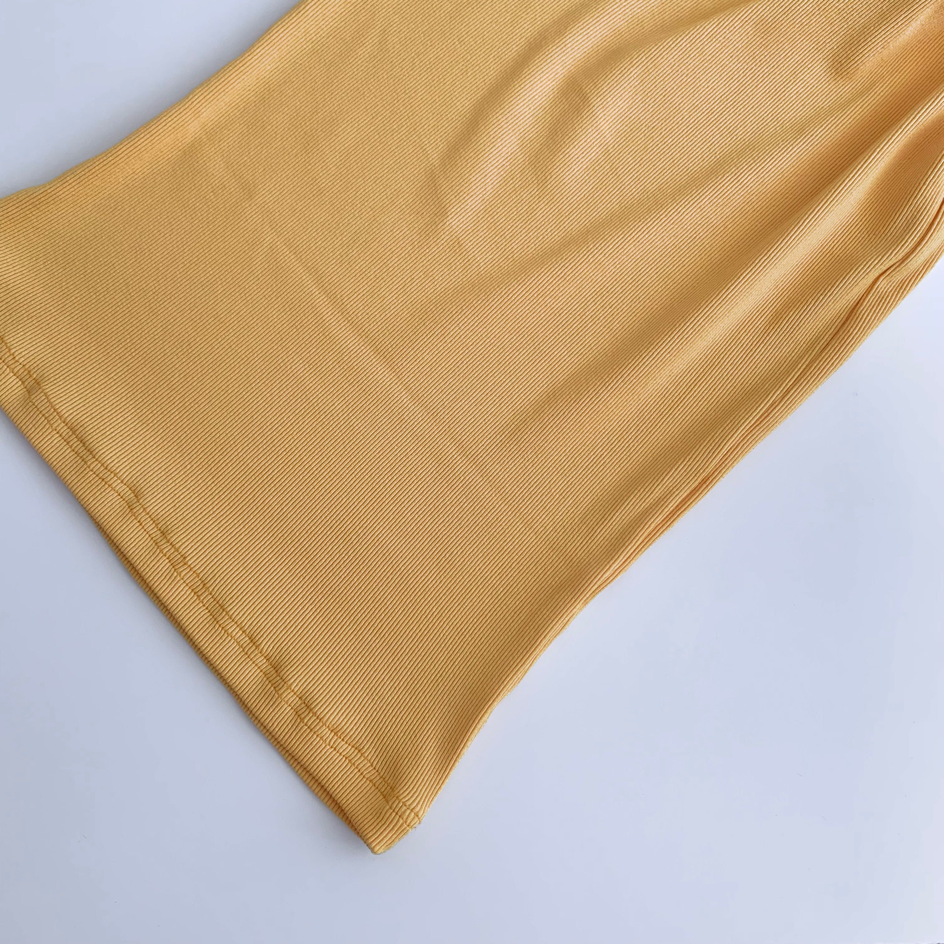 żółta sukienka midi z prążkowanego materiału na ramiączkach H&M 34/XS