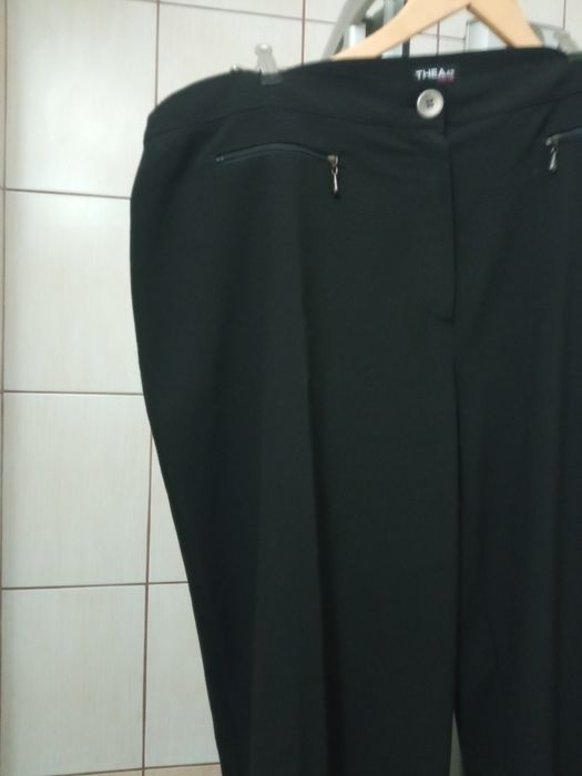 Spodnie damskie plus XXXL czarne eleganckie w kant z suwakiem