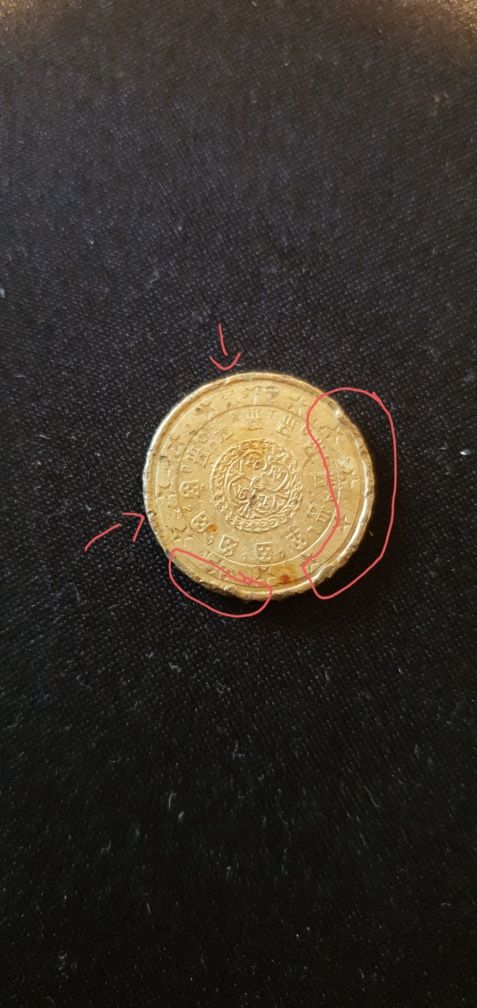 Moeda de 10 centimos com defeito