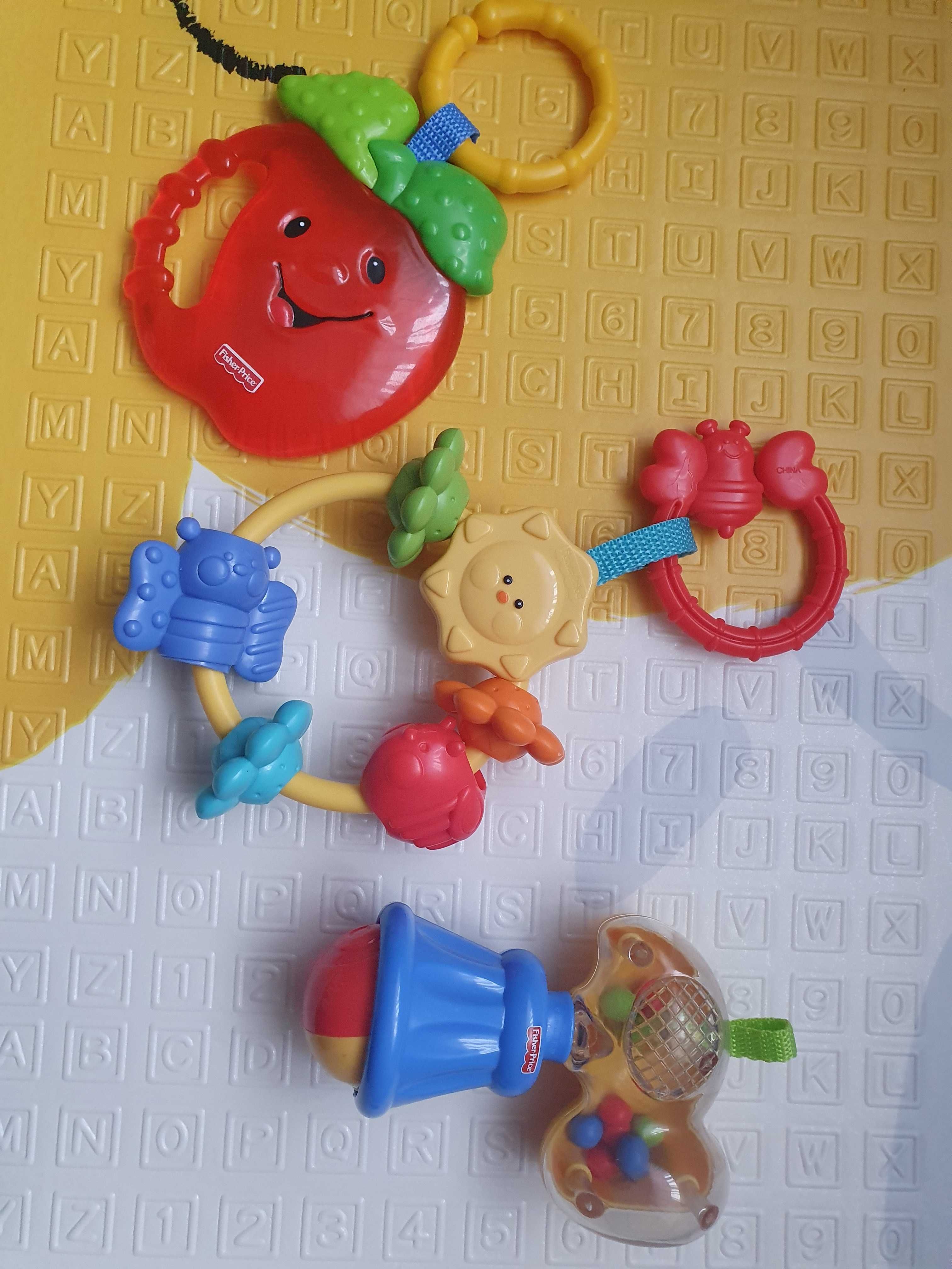 Fisher Price брязкальця та прорізувач