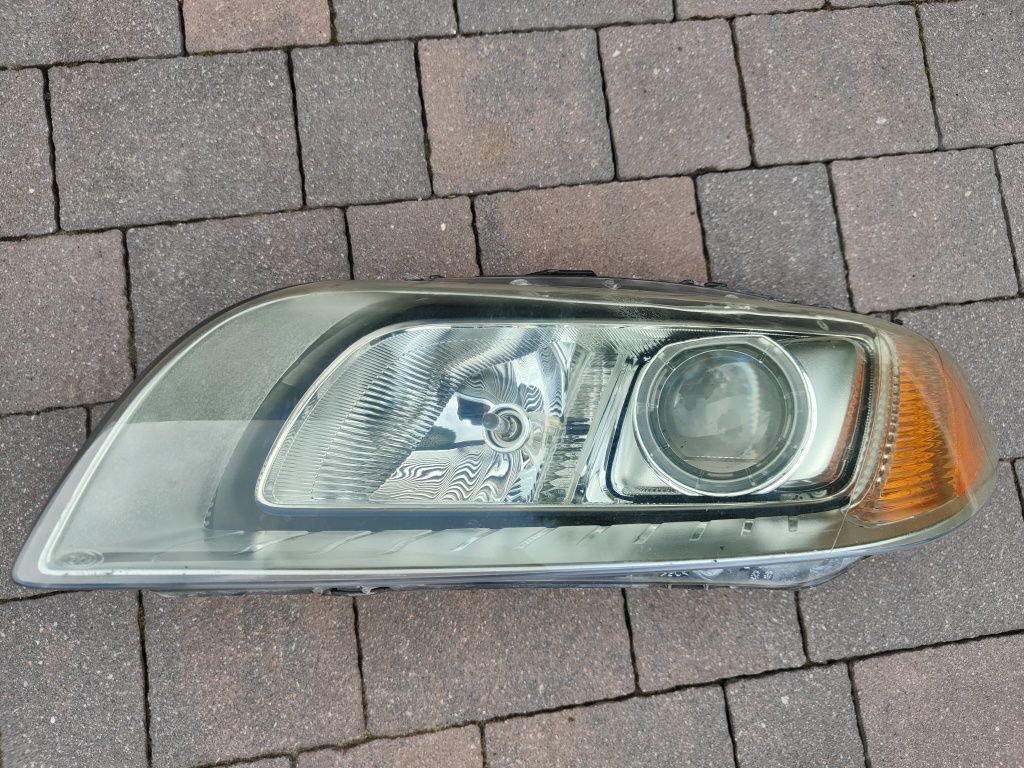 Volvo XC70 S80 lampa lewa skretna